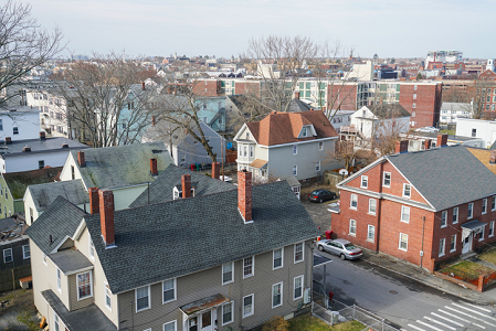 Aerial view of urban neighborhood with multifamily housing