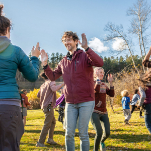 People playing a theater game outdoors