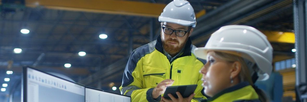 Female Industrial Engineer Works on Personal Computer She Designs 3D Turbine Model, Her Male Colleague Talks with Her and Uses Tablet Computer